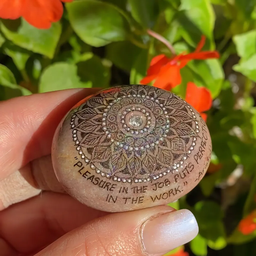 mandala painted pebble with Aristotle quote
