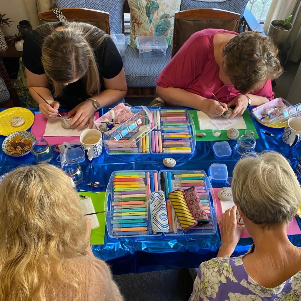Four lady students hard at work at a Pocket Pebbles class. Work shouldn't be this fun!