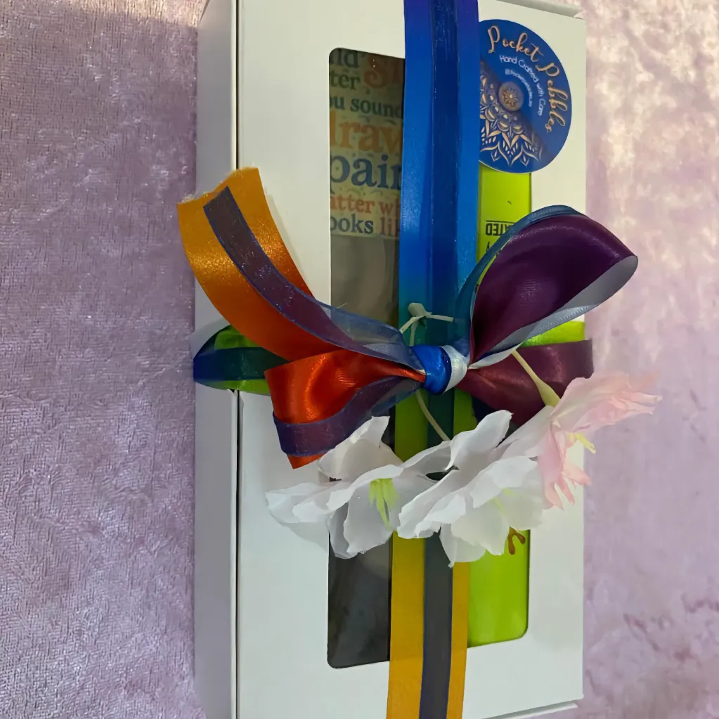 Single Pocket Pebbles paint pack with bow, ready for the next student or to be sent to a lucky recipient to paint at home or for a private lesson