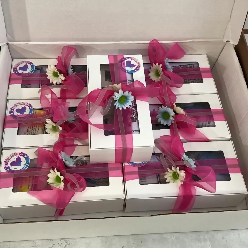 Large box containing paint pack boxes to be used for classes, paint-at-home projects, and private lessons